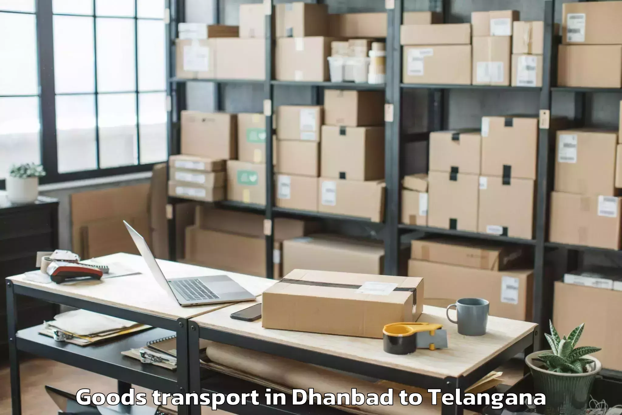 Professional Dhanbad to Timmapur Lmd Colony Goods Transport